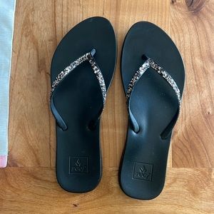 Reef black glitter flip flops